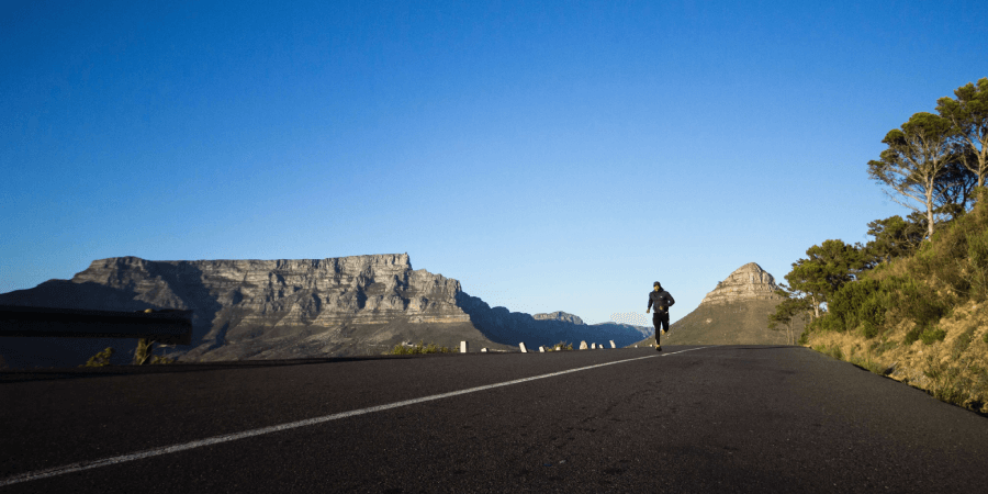 Man Jogging On Road