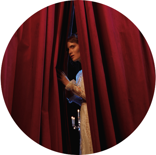 Anxious Actress Looking Through Stage Curtain