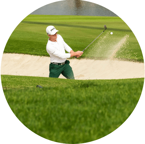 Golfer Chipping Out Of Bunker