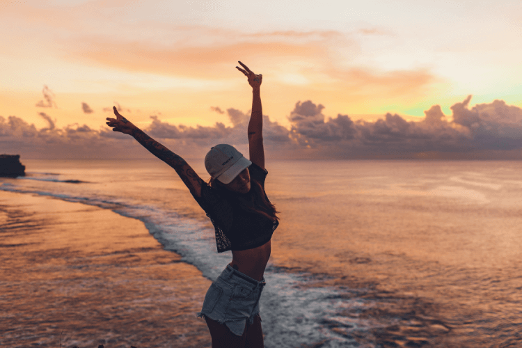 Happy Woman On The Beach