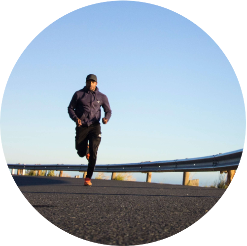 Man Jogging On Road