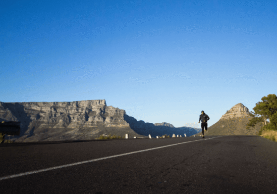 Man Jogging On Road